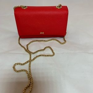 Crossbody bag red like new condition gold chain